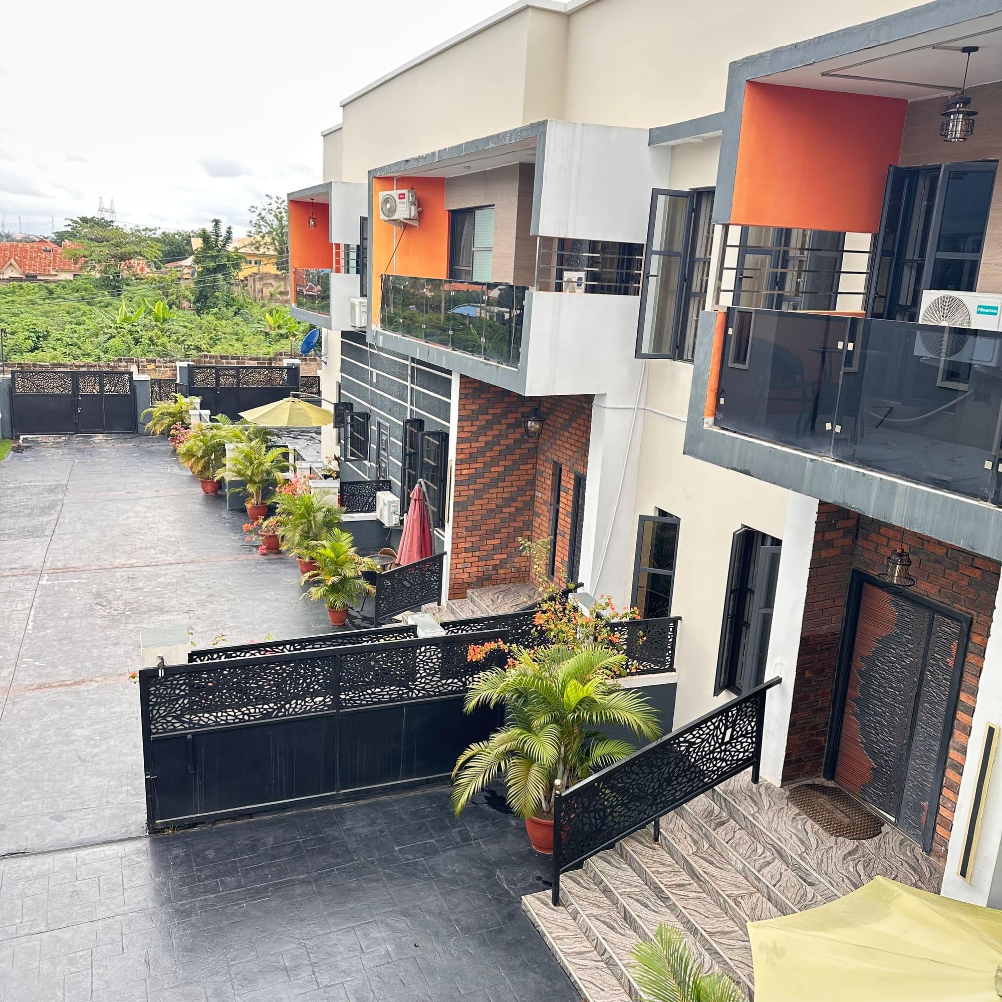 Front view of Best Terrace Homes terraces with balconies and landscaped walkway